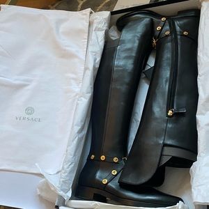 NWT. Black Versace riding boot. Over-the-knee leather boot.